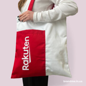 Брендований шопер з логотипом Rakuten і червоною кишенею